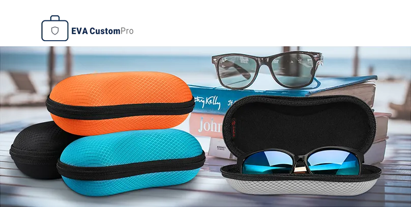 Stacked colorful hard EVA eyewear storage cases in orange, blue, and grey with sunglasses stored inside.