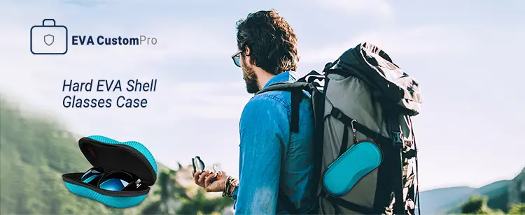 Custom hard EVA eyewear and sunglasses case with carabiner hook attached to hiker backpack, showing open case with sunglasses.