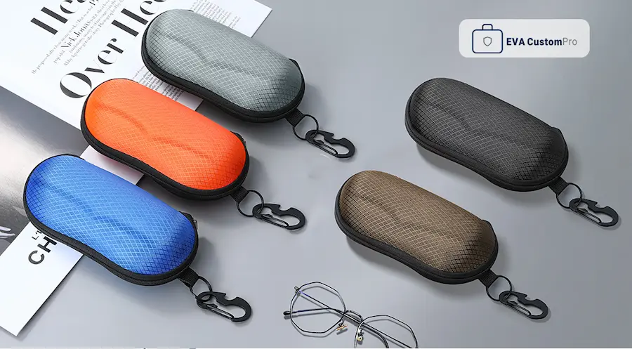 Multiple color options of hard EVA eyewear cases with diamond lattice fabric surface and plastic carabiner clips.