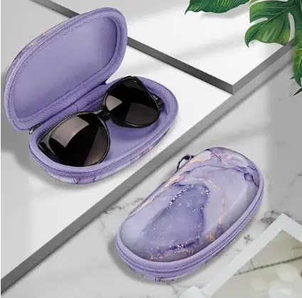 Custom EVA eyewear case showing interior layout with velvet lining, sunglass slot, and marble pattern hard shell.